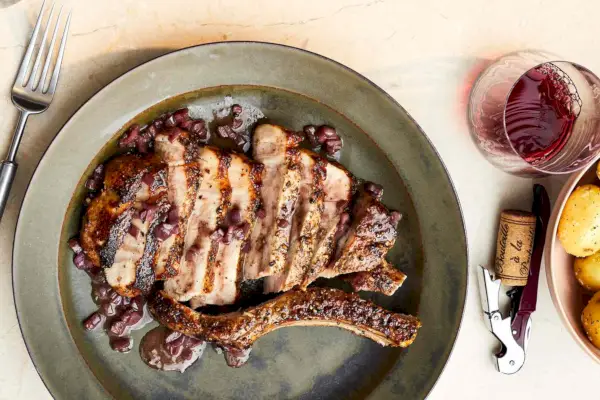 Pork Chop au Poivre with Red Wine Shallot Sauce