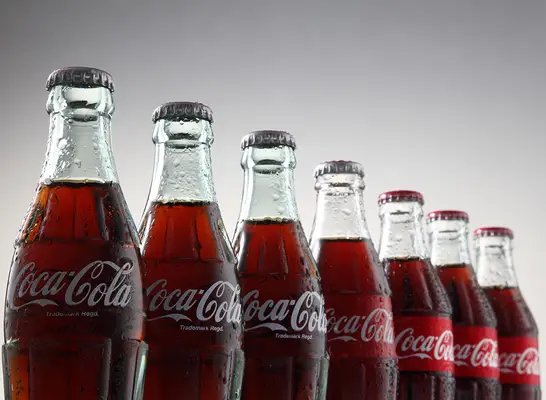 glass coke bottles in line