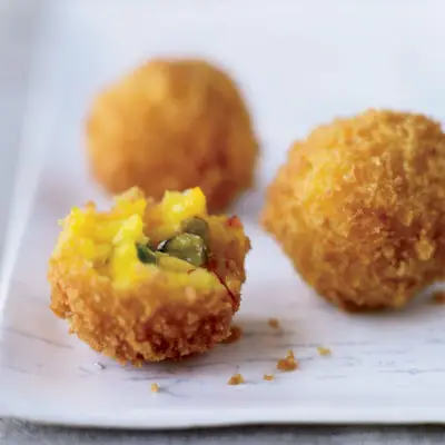 Opekaný pistáciový syr Arancini