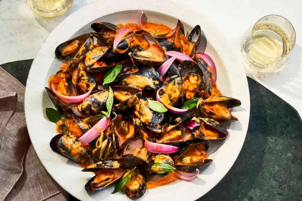 Rezept für Muscheln mit Harissa und Basilikum