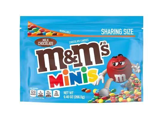 a bag of milk chocolate m & m minis on a white background.