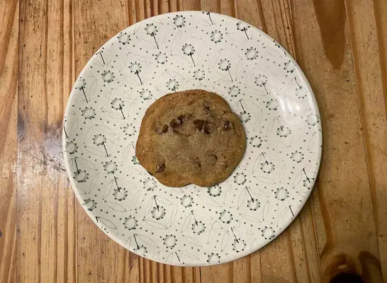 miss jones brand cookie on a printed plate.