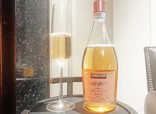 A bottle and glass of Costco