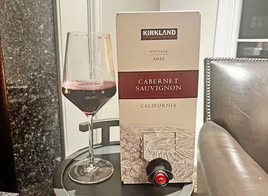 A box and glass of Costco
