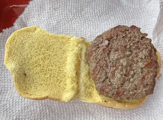 A cooked burger patty from Trader Joe