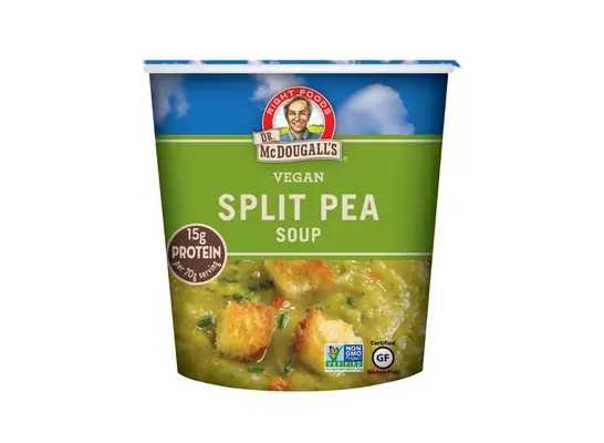 cup of ready-made split pea soup on a white background