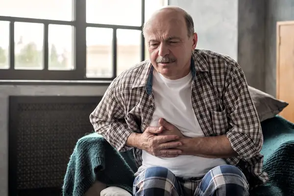 older man with liver pain