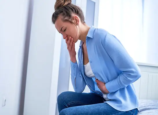 Woman Feeling Nauseous