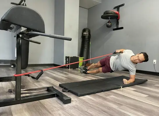 standing band crunch exercises for a slimmer stomach