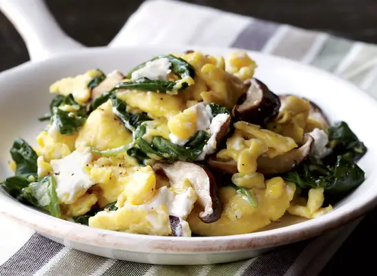 Vegetarian shiitake, spinach & goat cheese scramble