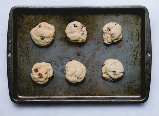chocolate chip cookies on sheet pan with non stick spray