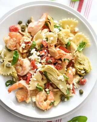 Shrimp recipes Shrimp Pasta with Roasted Red Peppers and Artichokes