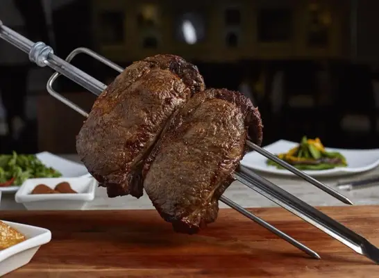 Skewered picanha (top sirloin) on the grill at Galpão Gaucho restaurant