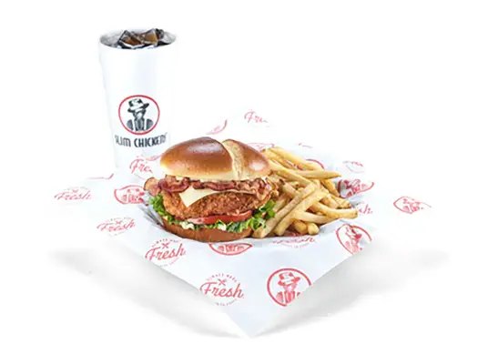 slim chickens club sandwich with fries and soda