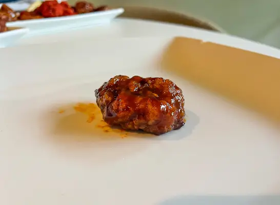 a cajun wing on a plate.