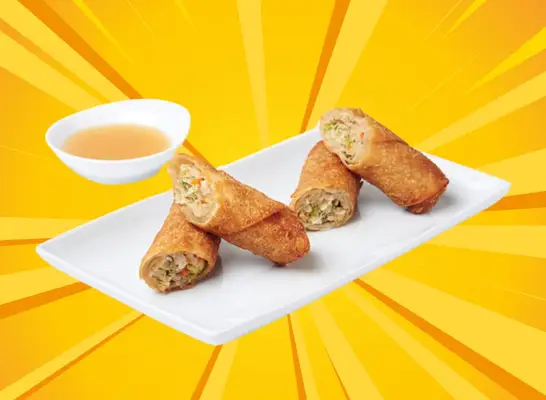 pick up stix egg rolls displayed on a plate with a side of sauce against a bright yellow designed background