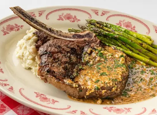bone in ribeye on a plate from Maggiano