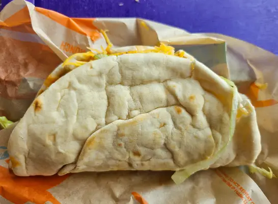 cheesy gordito crunch taco from taco bell.