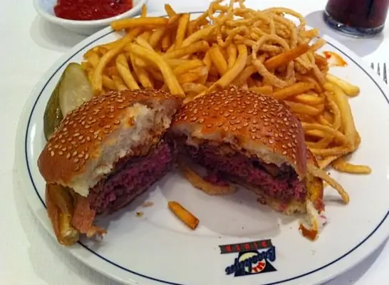 Bburgers on a hot griddle at Laha