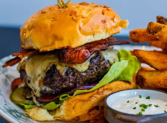 The Office Burger with fries and beer at Father