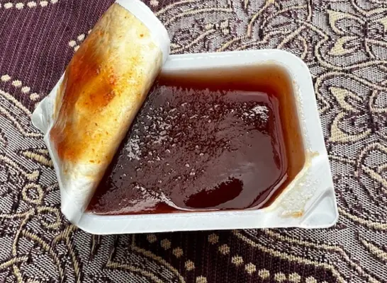 an open container of chick fil-a bbq sauce