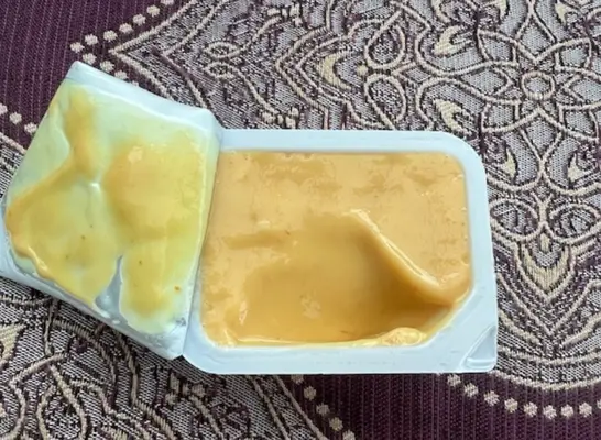 an open container of chick fil-a sauce
