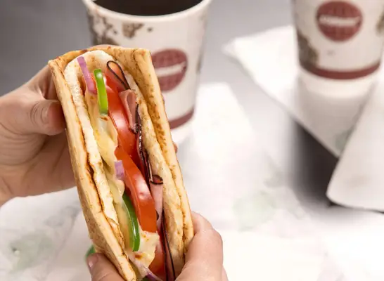 person holding subway