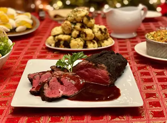 plated prime rib with side dishes