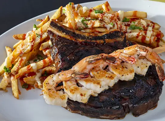 Yard House Ribeye and Shrimp dish
