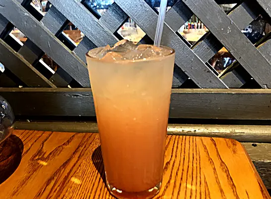 a glass of cracker barrel watermelon lemonade on the restaurant table