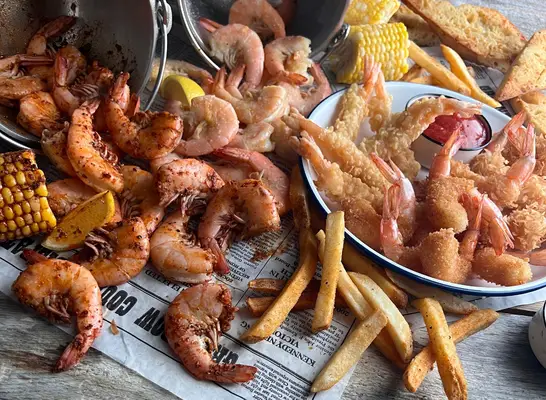 bubba gump shrimp, corn, fries, and bread