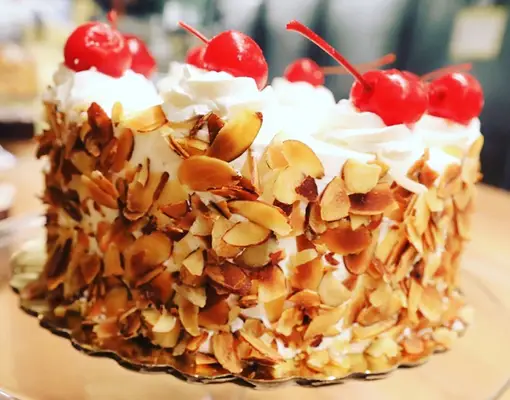 A cherry-topped cake from Roeser