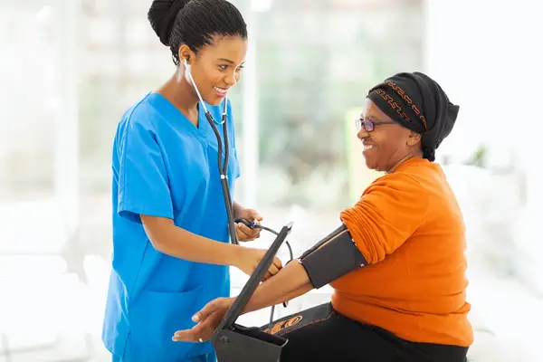 nurse checking woman