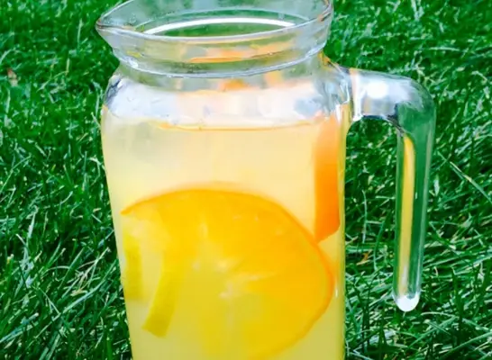 pouring green tea into cup