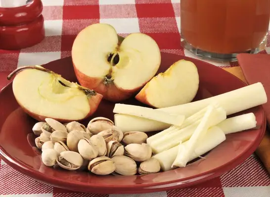 string cheese, apples, and pistachio