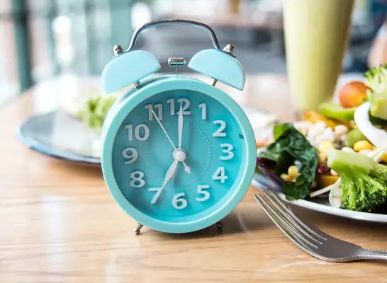 alarm clock, planned eating concept easy ways to lose weight when you
