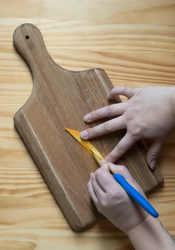 Leitfaden für Cocktailgarnituren mit Zitrusschalen' title=