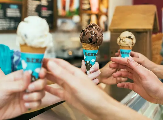 customers being handed ben and jerry