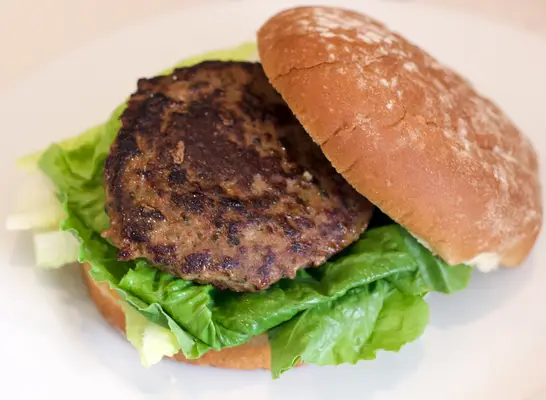 Tribali foods mediterranean beef burger cooked