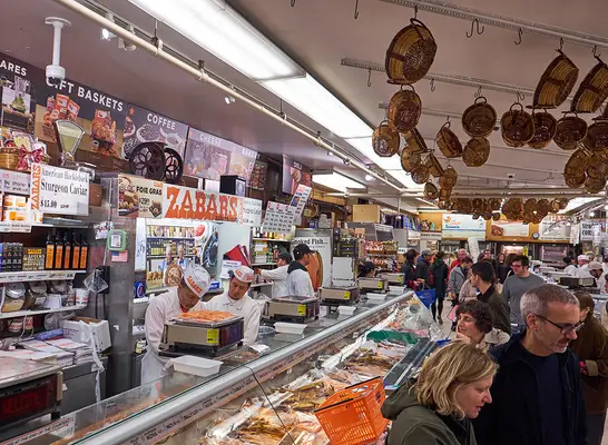 The fishmongers behind their desk at Zabar