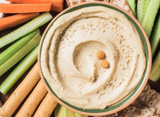 סימן הסכנה הגדול ביותר שאתה אוכל יותר מדי חומוס, נניח מומחים