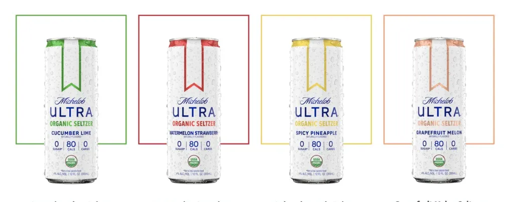 Štyri plechovky Michelob Ultra Signature seltzer s príchuťou uvedenou pod každou plechovkou.' title=
