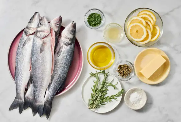 Rezept für ganz gerösteten Branzino mit Kapernbutter